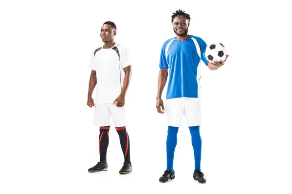 Full length view of athletic young african american sportsmen standing with soccer ball isolated on white — Stock Photo