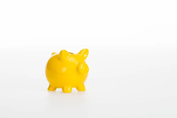 Close up view of yellow piggy bank isolated on white background — Stock Photo