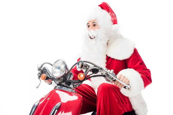 Alegre santa claus no traje equitação no scooter isolado no fundo branco — Fotografia de Stock