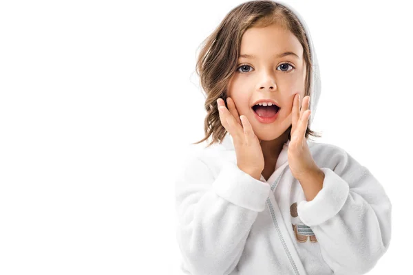 Portrait of emotional kid in white bathrobe isolated on white — Stock Photo