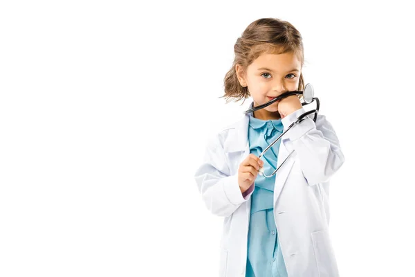 Kid dressed in doctors white coat with stethoscope isolated on white — Stock Photo