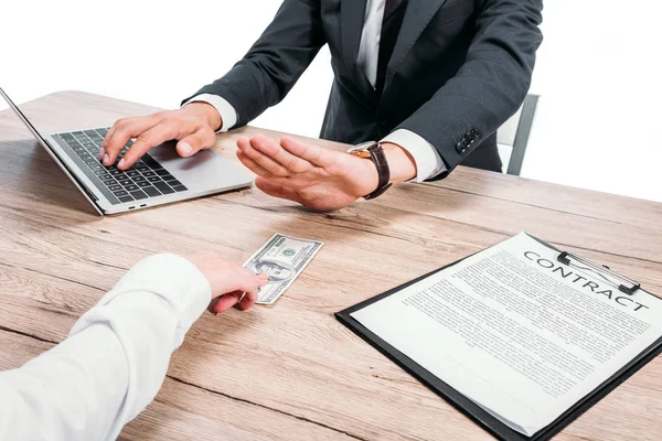 Cropped image of businessman rejecting bribe from colleague in office isolated on white — Stock Photo