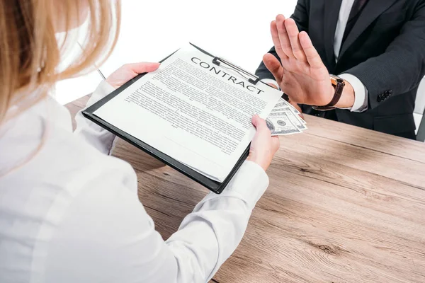 Cropped image of businessman rejecting bribe in office isolated on white — Stock Photo