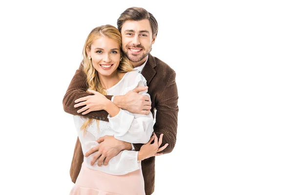Glücklich stilvoller Mann in Jacke umarmt Freundin isoliert auf weiß — Stockfoto