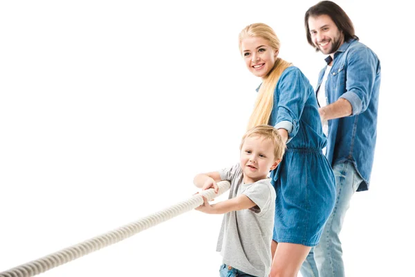 Happy family pulling the rope and playing tug of war isolated on white — Stock Photo