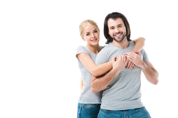 Impresionante pareja de adultos abrazando y sonriendo aislados en blanco - foto de stock