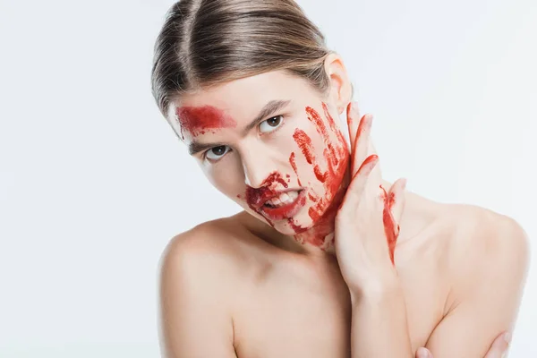 Angry adult naked woman with blood on skin isolated on white, domestic violence concept — Stock Photo