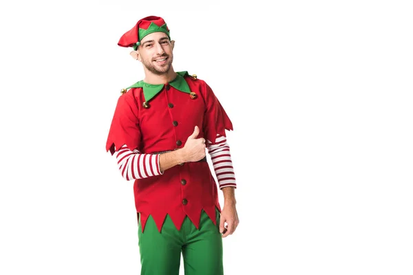 Smiling man in christmas elf costume looking at camera and doing thumbs up sign isolated on white — Stock Photo