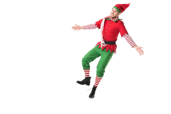 Cheerful man in christmas elf costume jumping isolated on white background — Stock Photo