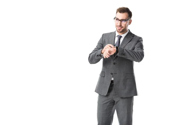 Bell'uomo d'affari adulto in occhiali con orologio isolato su bianco — Foto stock