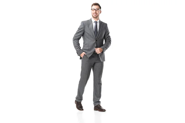 Красивий дорослий бізнесмен в костюмі і окулярах ізольовані на білому — стокове фото