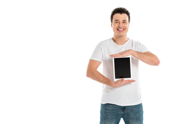 Homme beau souriant tenant tablette numérique avec écran blanc isolé sur blanc — Photo de stock