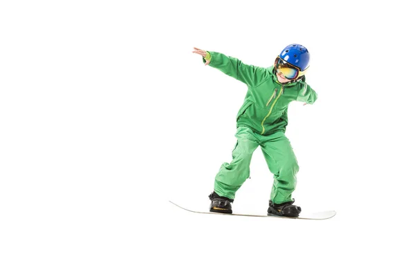 Preteen boy in green ski suit, goggles and blue helmet snowboarding isolated on white — Stock Photo