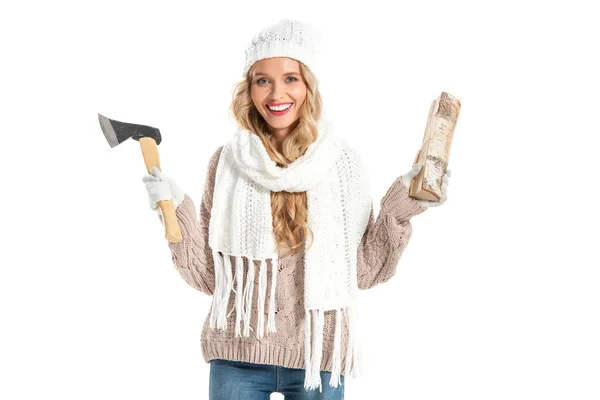 Beautiful smiling woman holding axe and one log isolated on white — Stock Photo