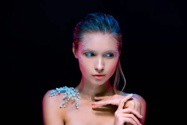 Portrait of young woman with  winter make up isolated on black — Stock Photo