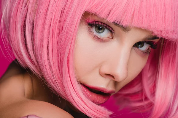 Charming fashionable girl posing in pink wig — Stock Photo