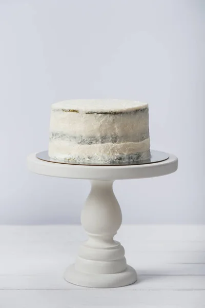 Creamy cake on tray isolated on white — Stock Photo