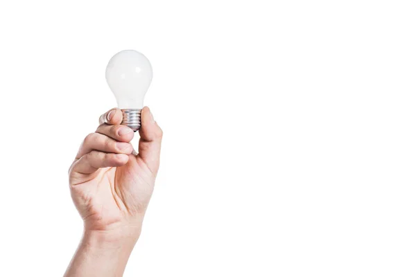 Vue recadrée de l'homme tenant l'ampoule isolée sur blanc, concept d'efficacité énergétique — Photo de stock