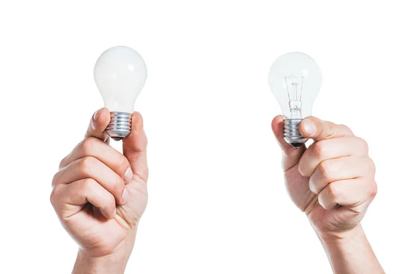 Visão recortada de mãos masculinas segurando lâmpadas led em mãos isoladas em branco, conceito de eficiência energética — Fotografia de Stock