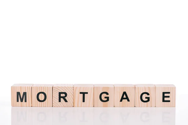 Wooden blocks with mortgage lettering isolated on white — Stock Photo