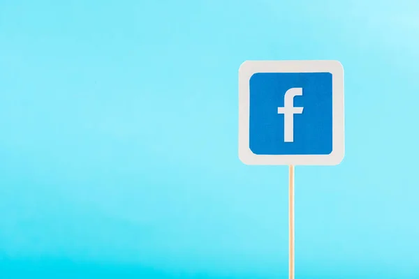 Top view of facebook icon isolated on blue with copy space — Stock Photo