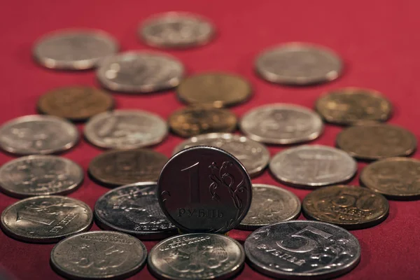 Close-up view of russian rubles coins on red, selective focus — Stock Photo