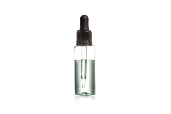 Studio shot of serum glass bottle isolated on white background — Stock Photo