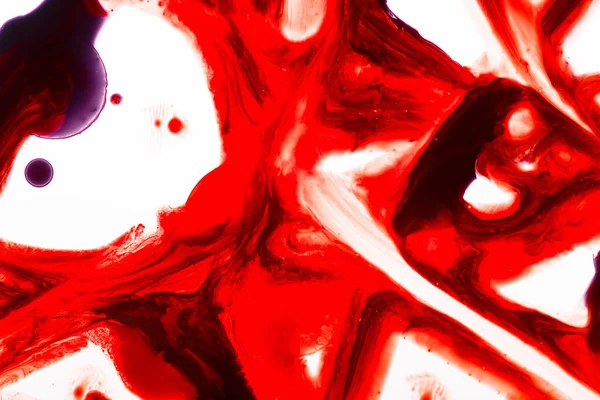 Spruzzi rossi e viola su sfondo bianco — Foto stock