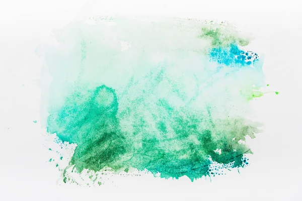 Vue de dessus du déversement d'aquarelle turquoise sur fond blanc — Photo de stock