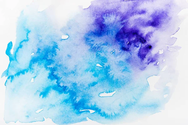 Top view of blue and purple spills on white paper — Stock Photo