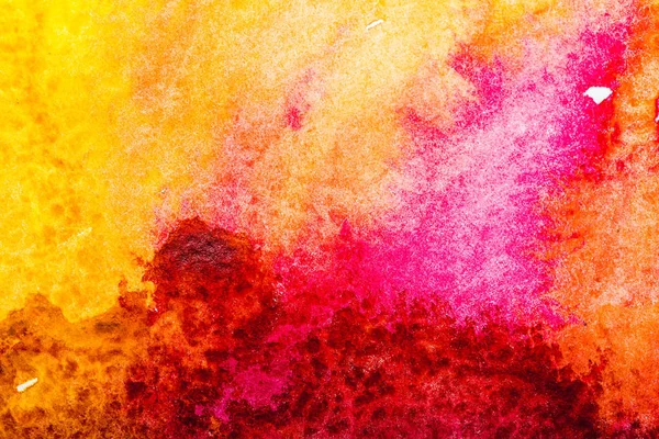 Top view of red, pink, yellow watercolor spills with copy space — Stock Photo