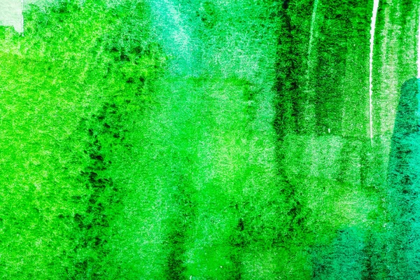 Top view of green watercolor brushstrokes with copy space — Stock Photo
