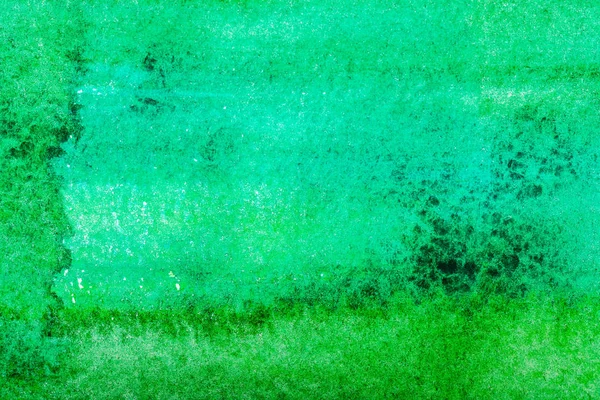 Top view of green watercolor spill with copy space — Stock Photo