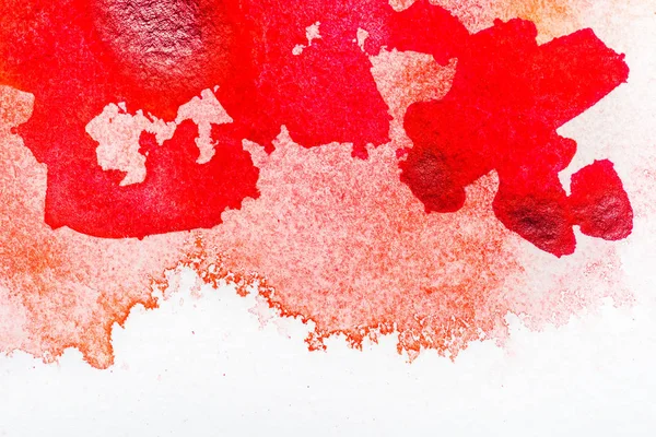 Top view of red watercolor spill on white background with copy space — Stock Photo