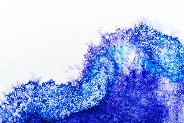 Draufsicht auf blaues Aquarell auf weißem Hintergrund — Stockfoto