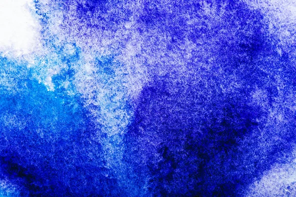 Top view of blue and purple watercolor spills on white background with copy space — Stock Photo