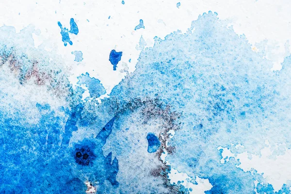 Draufsicht auf blaues Aquarell auf weißem Papier — Stockfoto