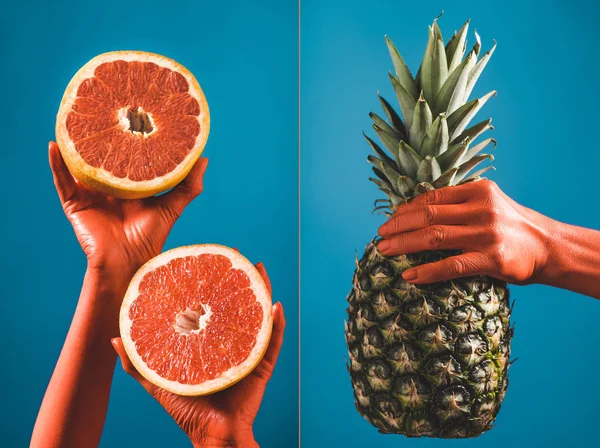 Collage of fruits in coral colored female hands on blue background, color of 2019 concept — Stock Photo