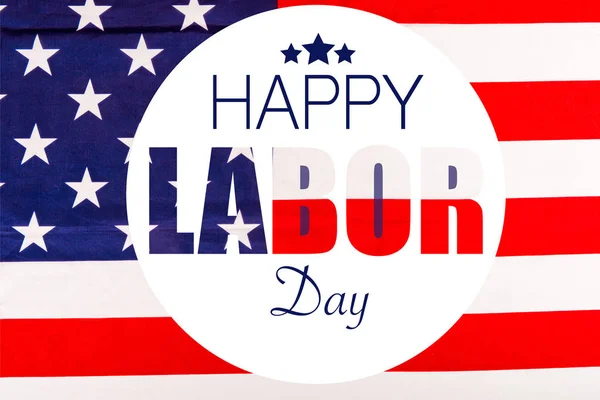 Happy Labor Day Schriftzug in weißem Kreis mit Sternen auf amerikanischer Flagge — Stockfoto