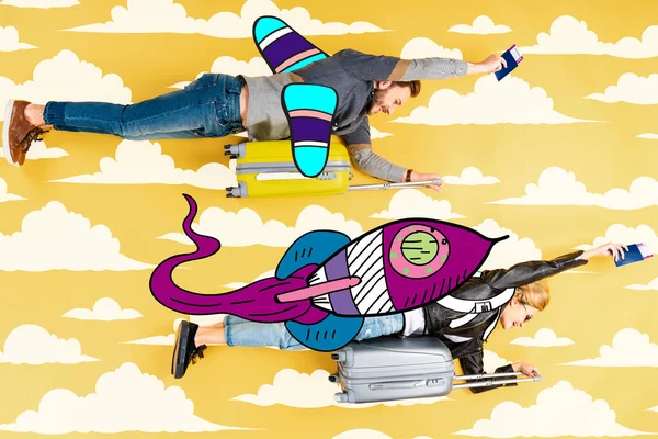 Happy couple flying as rockets in sky on suitcases with passports and air tickets on yellow background with clouds illustration — Stock Photo