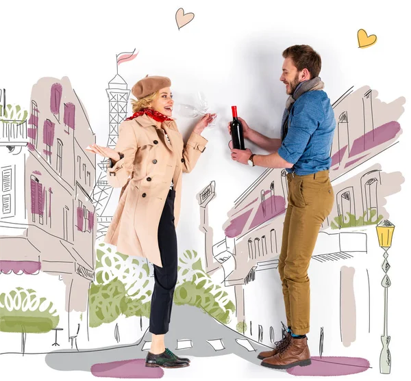 Happy elegant couple holding wine bottle and glasses with Paris illustration on background — Stock Photo