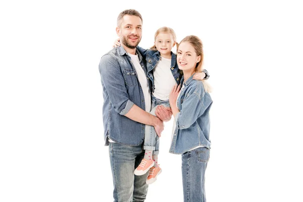Щасливі батьки в джинсах тримають дочку ізольовано на білому — стокове фото