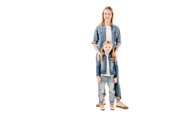 Full length view of smiling mother and daughter isolated on white — Stock Photo