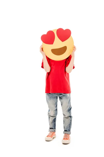 КИЕВ, УКРАИНА - 20 ДЕКАБРЯ 2019 г.: полный обзор ребенка, держащего улыбку с глазами сердца, изолированными на белом — стоковое фото