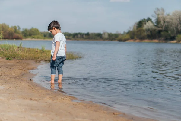 Cute Boy Standing Lake Wet Sand — Stock Photo, Image