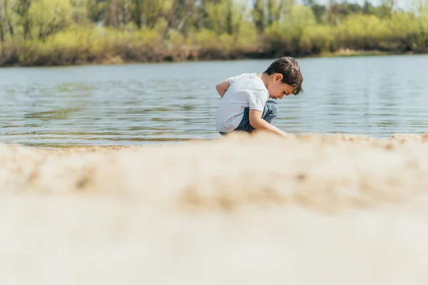 Selective Focus Cute Boy Sitting Pond — Stock Photo, Image