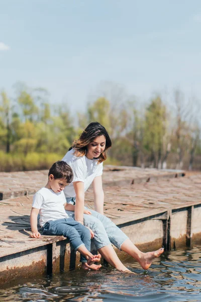 Barefoot Mother Cute Son Sitting Lake — Stock Photo, Image