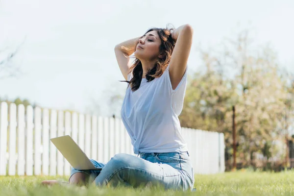 Selective Focus Attractive Freelancer Closed Eyes Sitting Grass Relaxing Laptop — Stock Photo, Image