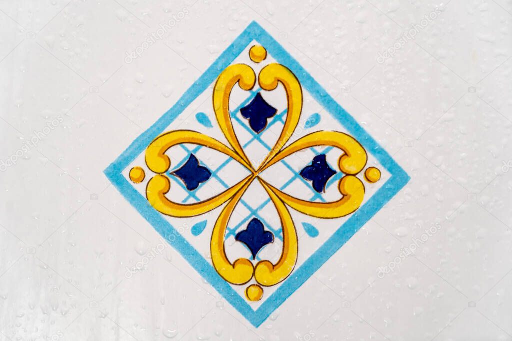 Traditional ornate italian decorative ceramic tiles from Vietri, colorful background.