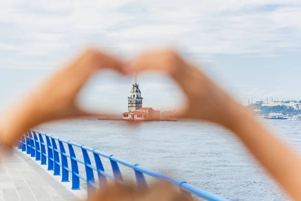 Beautiful Woman Traveler Makes Heart Shape Hands View Maidens Tower — стоковое фото